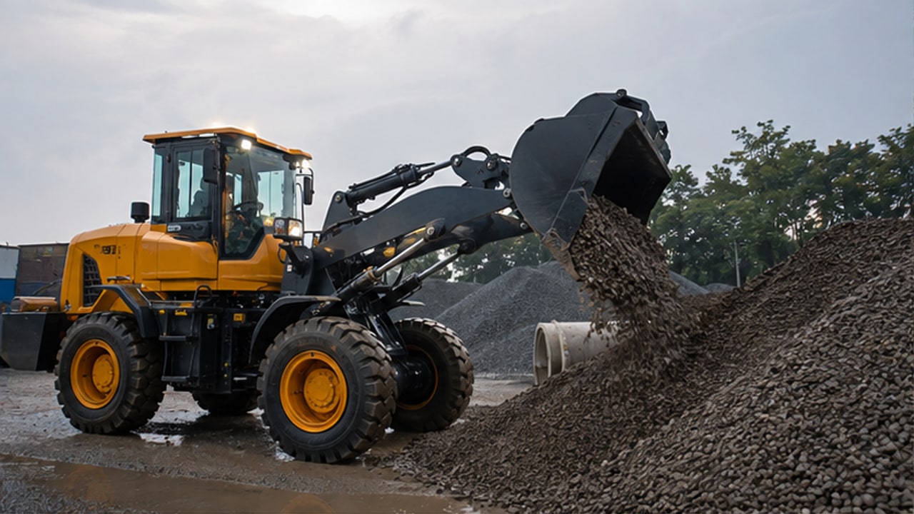 How Can a Diesel Wheel Loader Maintain Traction on Wet Aggregate Stockpiles?