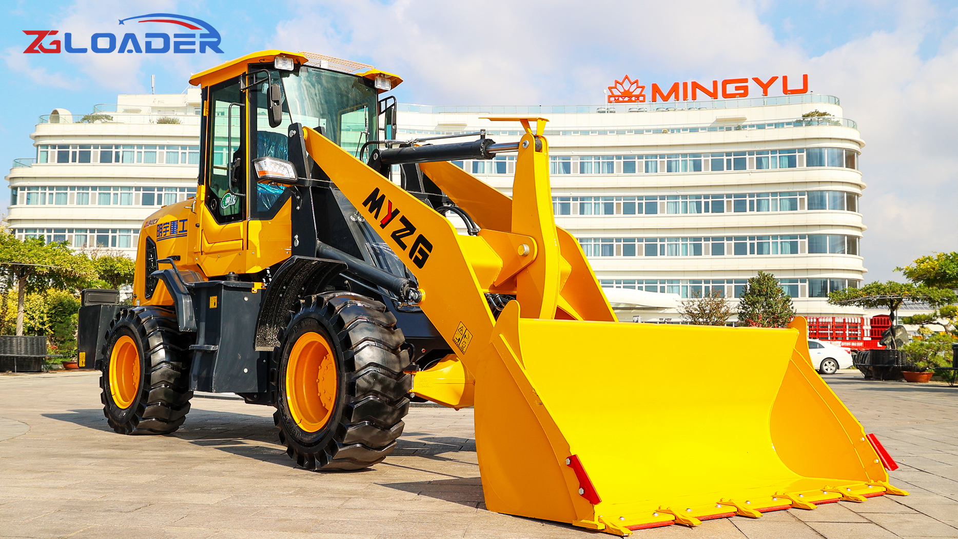 MYZG front end wheel loader equipped with a long arm grass grapple!