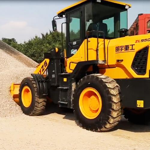 What are the different types of wheel loaders and their uses?