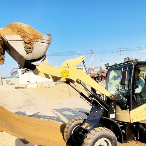 How do you control a wheel loader?