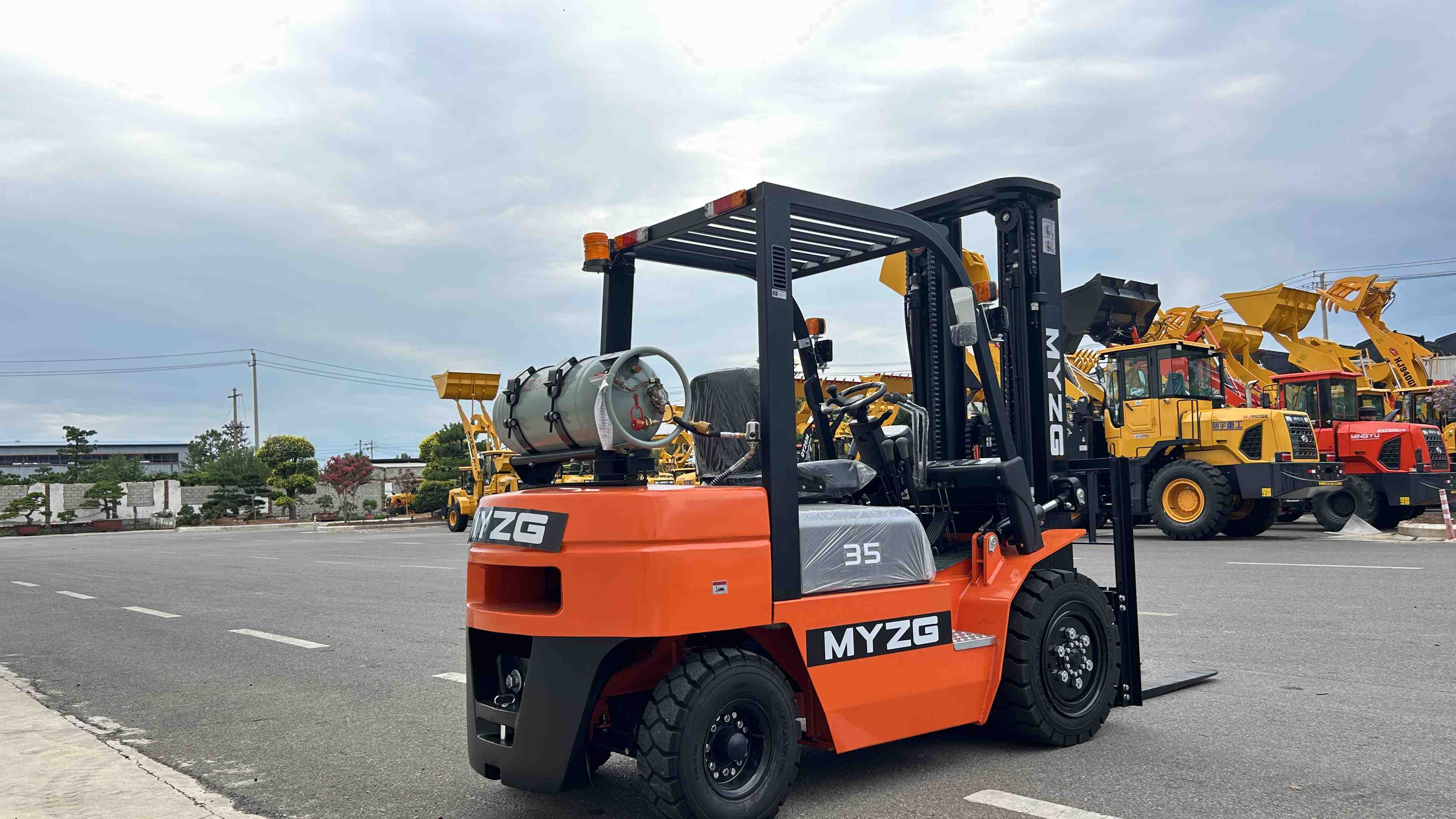 What should I consider when choosing between a dedicated LPG and an LPG dual-fuel forklift?