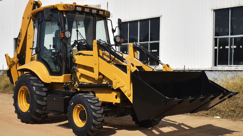 What is the difference between radial lift and vertical lift on a skid steer?