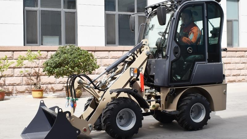 Compact 600kg Mini Wheel Loader with Euro V Engine Compact 600kg Mini Wheel Loader with Euro V Engine