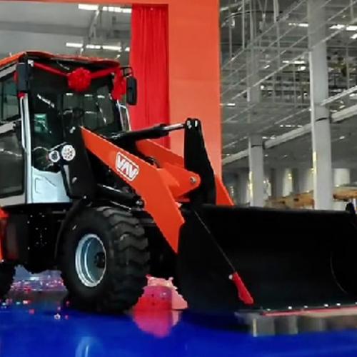 What is a mini backhoe called?